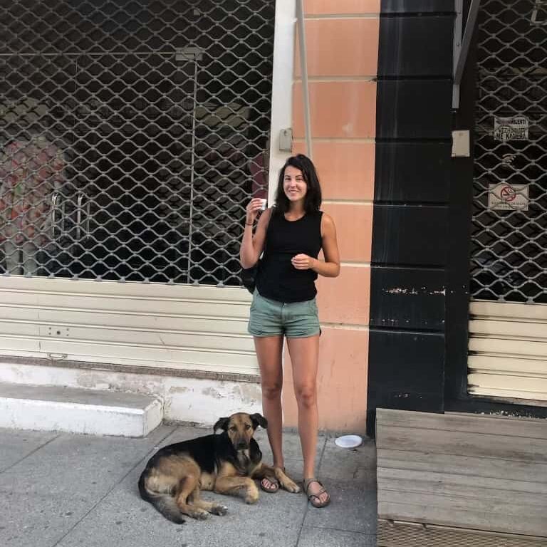 Me and a dog, waiting for a bus in Albania